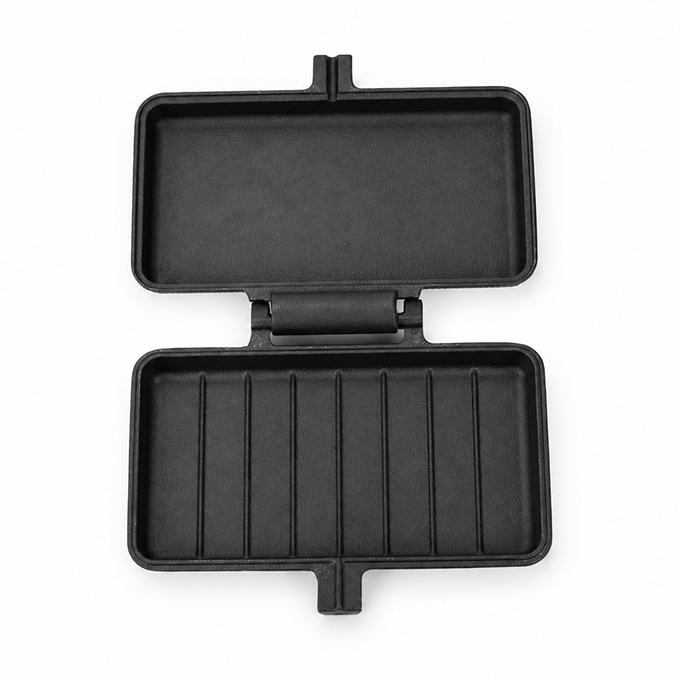 Ribbed Cast Iron Pie Iron with Textured Exterior and Internal Ridges